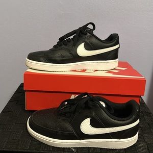 Women’s size 7 Nike Court Vision Low. Black & white. Lightly used with box.